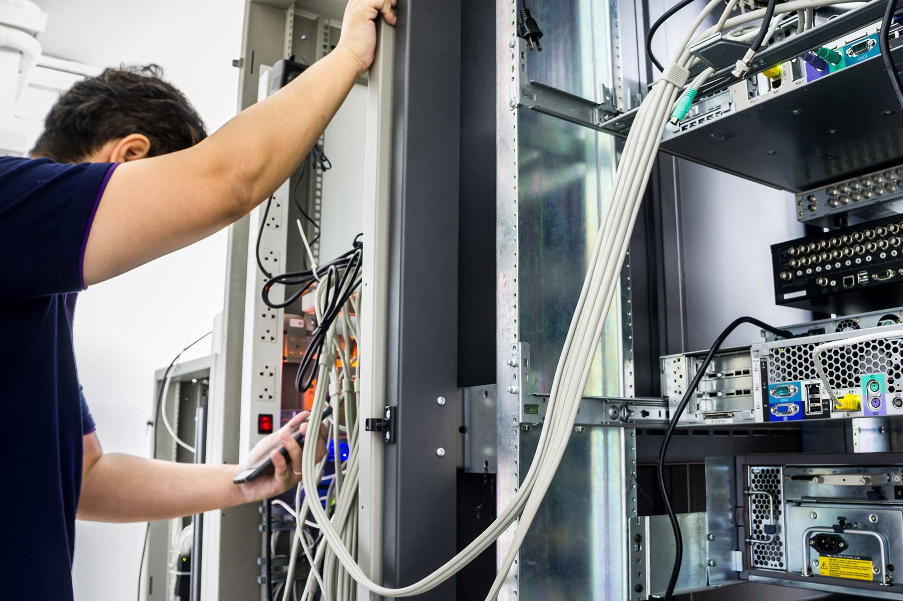 Technician working on a computer network